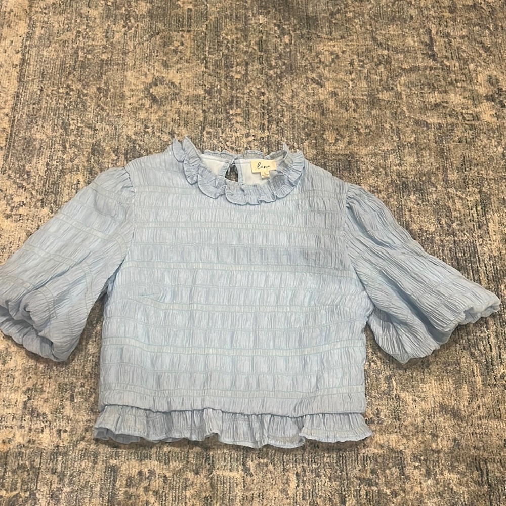 Puffed sleeve blue frilly shirt